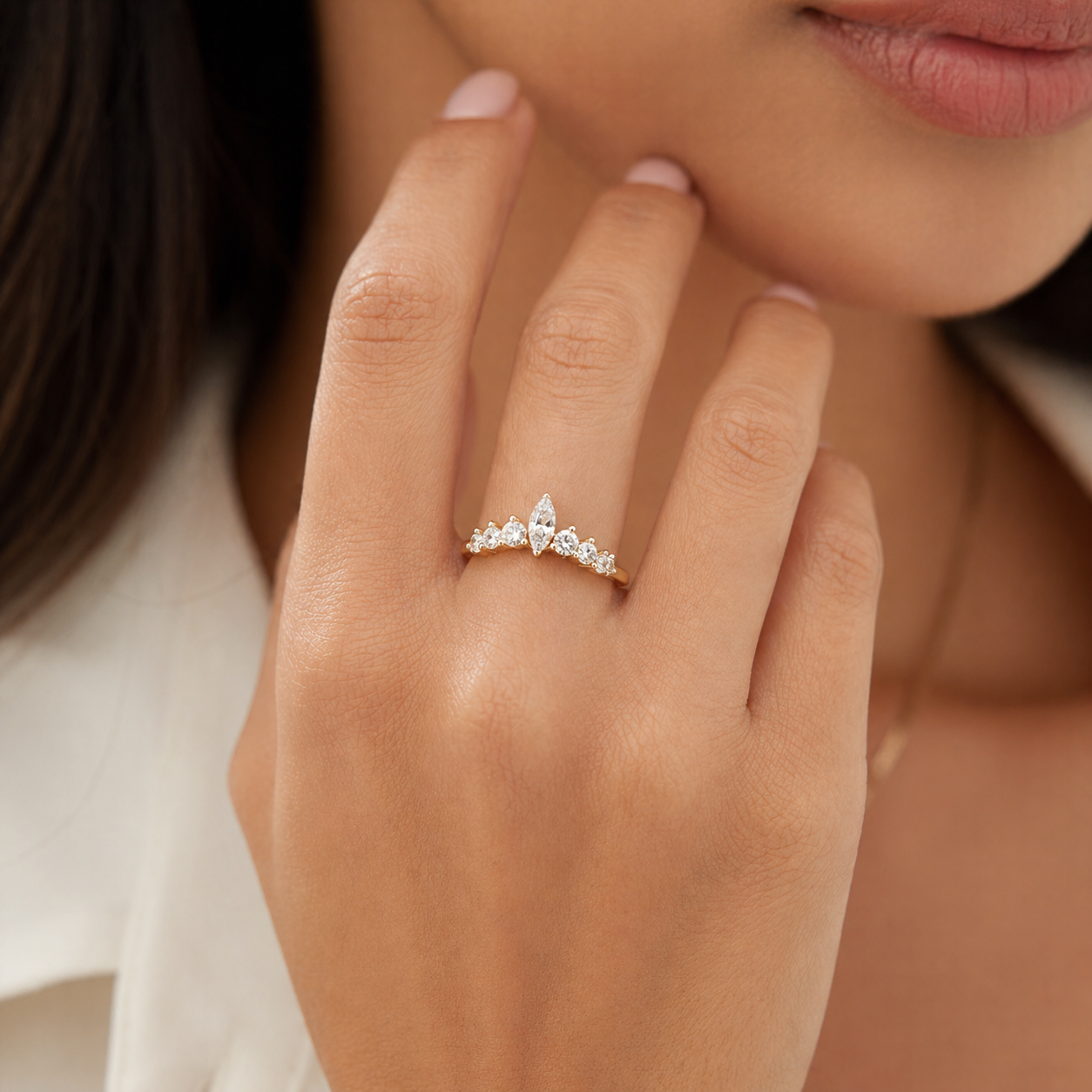 Crown-inspired curved RING
